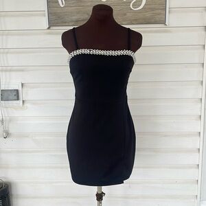 Elegant Black Dress with Pearl Detailing